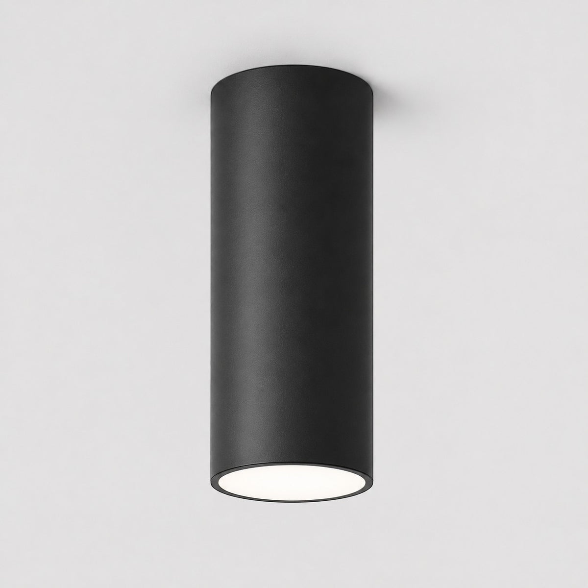 Lumiris spot LED tube surface noir en aluminium, éclairage design moderne pour bureau ou salon.
